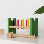 https://demoshine.revoapps.id/wp-content/uploads/2024/12/Colorful-wooden-toy-and-plant-arrangement-150x150.jpg